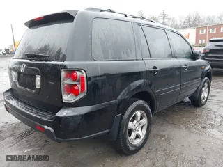 2006 Honda Pilot EX with VIN 2HKYF18486H527682, listed as a IAAI auction lot 41941295 with 235,521 mi miles. Bid and sale history available at carsss.com. Image 4.