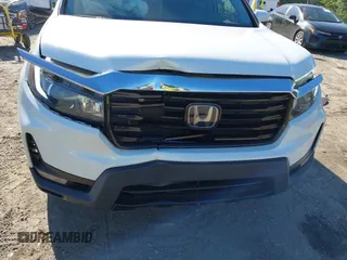 2021 Honda Ridgeline RTL-E with VIN 5FPYK3F7XMB011525, listed as a IAAI auction lot 41774012 with 98,031 mi miles and . Bid and sale history available at DreamBid. Image 6.