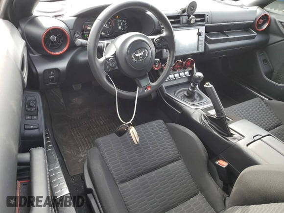 2023 Toyota 86 with VIN JF1ZNBB13P9762566, listed as a Copart auction lot 60736085 with 13,589 mi miles and Salvage title. Bid and sale history available at DreamBid. Image 8.