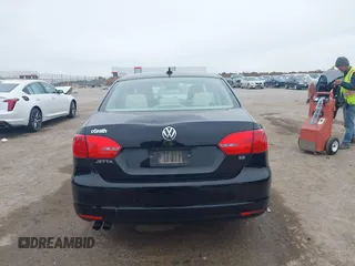 2014 Volkswagen Jetta Sedan SE w/Connectivity with VIN 3VWD07AJ4EM370905, listed as a IAAI auction lot 41472856 with 146,662 mi miles. Bid and sale history available at carsss.com. Image 16.