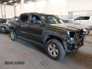 2009 Toyota Tacoma z VIN 3TMLU42NX9M034443, wystawiony jako IAAI lot #41676569 z przebiegiem 96 743 mil mil oraz . Historia ofert i sprzedaży dostępna na DreamBid. Obrazek 1.
