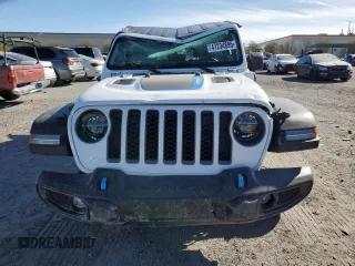 2022 Jeep Wrangler Unlimited Rubicon with VIN 1C4JJXR63NW206144, listed as a Copart auction lot 47234895 with 5,876 mi miles and Salvage title. Bid and sale history available at DreamBid. Image 5.