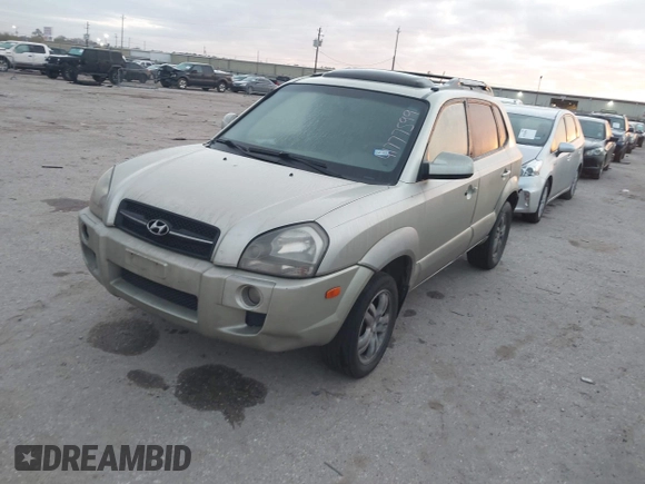 2007 Hyundai Tucson SE with VIN KM8JN12D77U539841, listed as a IAAI auction lot 41777599 with 126,958 mi miles. Bid and sale history available at carsss.com. Image 2.