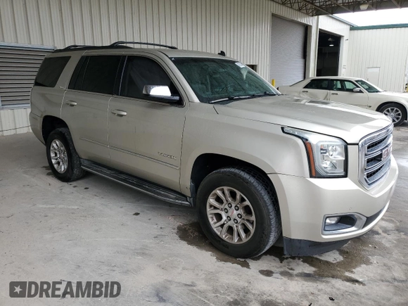 2015 GMC Yukon SLE with VIN 1GKS1AKC5FR120713, listed as a Copart auction lot 48009325 with 133,372 mi miles and Salvage Title. Bid and sale history available at carsss.com. Image 4.