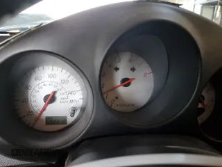 2005 Toyota MR2 z VIN JTDFR320450072938, wystawiony jako Copart lot #57668685 z przebiegiem 66 512 mil mil oraz Szkoda całkowita • Salvage title. Historia ofert i sprzedaży dostępna na DreamBid. Obrazek 9.