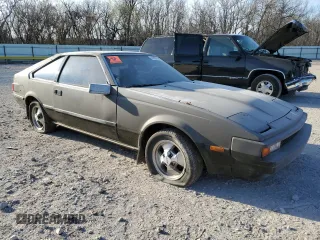 1982 Toyota Supra z VIN JT2MA67LXC0032341, wystawiony jako Copart lot #49951115 z przebiegiem 76 389 mil mil oraz Czysty tytuł • Clean title. Historia ofert i sprzedaży dostępna na DreamBid. Obrazek 4.