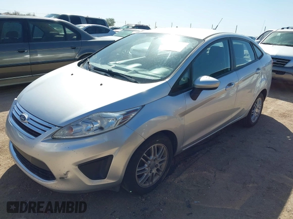 2011 Ford Fiesta SE with VIN 3FADP4BJ4BM177814, listed as a IAAI auction lot 41694964 with 180,565 mi miles. Bid and sale history available at carsss.com. Image 2.