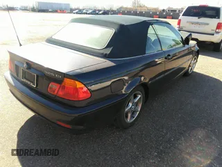 2004 BMW 3 Series 325Ci with VIN WBABW33474PL29697, listed as a IAAI auction lot 41718697 with 151,815 mi miles. Bid and sale history available at carsss.com. Image 4.