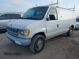 1999 Ford Econoline Cargo Commercial with VIN 1FTNE24L3XHB84868, listed as a IAAI auction lot 41151145 with 450,651 mi miles and . Bid and sale history available at carsss.com. Image 2.