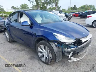 2023 Tesla Model Y Long Range z VIN 7SAYGDEE5PA102285, wystawiony jako IAAI lot #42402981 z przebiegiem 24 550 mil mil oraz . Historia ofert i sprzedaży dostępna na DreamBid. Obrazek 1.