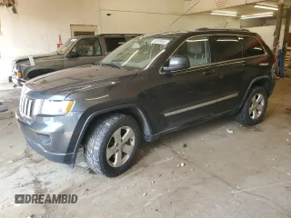 2011 Jeep Grand Cherokee Laredo with VIN 1J4RR4GG6BC641138, listed as a Copart auction lot 60209955 with 218,235 mi miles and Clean title. Bid and sale history available at DreamBid. Image 1.