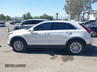 2024 Cadillac XT4 FWD Luxury with VIN 1GYAZAR42RF168331, listed as a IAAI auction lot 41980130 with 10,335 mi miles and . Bid and sale history available at carsss.com. Image 14.