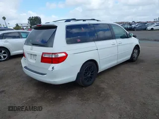 2006 Honda Odyssey EX-L z VIN 5FNRL38766B452806, wystawiony jako IAAI lot #41931830 z przebiegiem 133 822 mil mil oraz . Historia ofert i sprzedaży dostępna na DreamBid. Obrazek 4.
