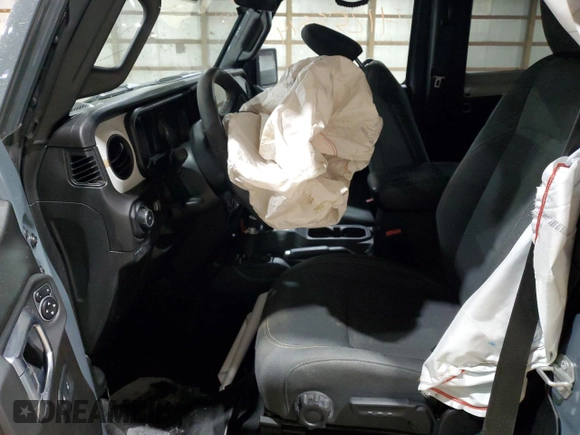 2024 Jeep Wrangler Willys with VIN 1C4PJXAG4RW260511, listed as a Copart auction lot 42425645 with 11,996 mi miles and Salvage title. Bid and sale history available at DreamBid. Image 7.