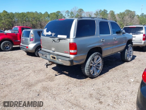 2001 GMC Yukon SLT with VIN 1GKEK13V11R220343, listed as a IAAI auction lot 41703786 with 213,518 mi miles. Bid and sale history available at carsss.com. Image 4.