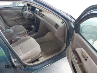 1998 Toyota Camry LE z VIN 4T1BG22K2WU296053, wystawiony jako IAAI lot #42334546 z przebiegiem 257 496 mil mil oraz . Historia ofert i sprzedaży dostępna na DreamBid. Obrazek 5.