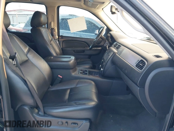 2012 Chevrolet Tahoe LT with VIN 1GNSKBE09CR295291, listed as a IAAI auction lot 41261810 with 133,400 mi miles and . Bid and sale history available at DreamBid. Image 5.