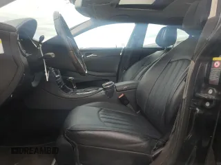 2009 Mercedes-Benz CLS-Class 5.5L with VIN WDDDJ72X99A142572, listed as a Copart auction lot 52297195 with 87,520 mi miles and Salvage Title. Bid and sale history available at carsss.com. Image 7.