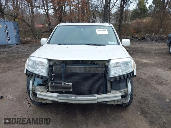 2013 Honda Pilot Touring with VIN 5FNYF4H96DB031577, listed as a IAAI auction lot 41699838 with 180,876 mi miles. Bid and sale history available at carsss.com. Image 12.