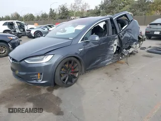 2016 Tesla Model X 70D with VIN 5YJXCAE27GF015175, listed as a IAAI auction lot 41074929 with 115,130 mi miles. Bid and sale history available at carsss.com. Image 2.
