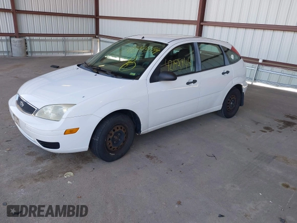 2007 Ford Focus S z VIN 1FAFP37N97W238404, wystawiony jako IAAI lot #42195944 z przebiegiem 168 390 mil mil oraz . Historia ofert i sprzedaży dostępna na DreamBid. Obrazek 2.
