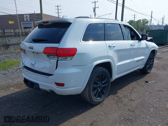 2017 Jeep Grand Cherokee Overland with VIN 1C4RJFCT6HC880306, listed as a IAAI auction lot 42534987 with 97,976 mi miles and . Bid and sale history available at DreamBid. Image 4.