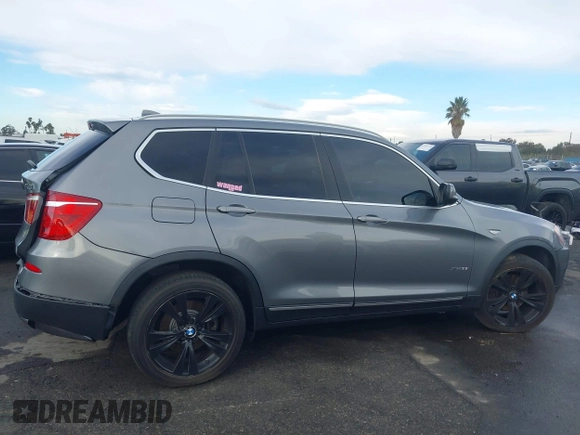 2013 BMW X3 xDrive35i with VIN 5UXWX7C5XDL977879, listed as a IAAI auction lot 41396936 with 107,727 mi miles and . Bid and sale history available at DreamBid. Image 12.