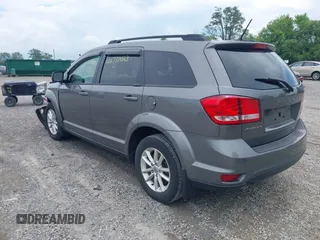 2013 Dodge Journey SXT with VIN 3C4PDCBG8DT517733, listed as a IAAI auction lot 42737063 with 67,363 mi miles and . Bid and sale history available at DreamBid. Image 3.