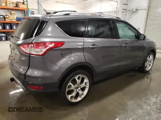 2014 Ford Escape Titanium with VIN 1FMCU9J95EUA84671, listed as a Copart auction lot 47398165 with 84,453 mi miles and Salvage Title. Bid and sale history available at DreamBid. Image 3.