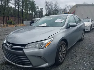 2015 Toyota Camry XLE with VIN 4T1BF1FKXFU955780, listed as a IAAI auction lot 41731667 with 210,750 mi miles and . Bid and sale history available at DreamBid. Image 2.