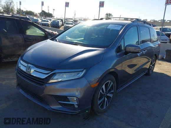 2018 Honda Odyssey Elite with VIN 5FNRL6H91JB052289, listed as a IAAI auction lot 41336068 with 94,685 mi miles and . Bid and sale history available at DreamBid. Image 16.