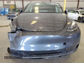 2023 Tesla Model Y Long Range z VIN 7SAYGDEE3PF862038, wystawiony jako Copart lot #57639325 z przebiegiem 11 020 mil mil oraz Szkoda całkowita • Salvage title. Historia ofert i sprzedaży dostępna na DreamBid. Obrazek 5.