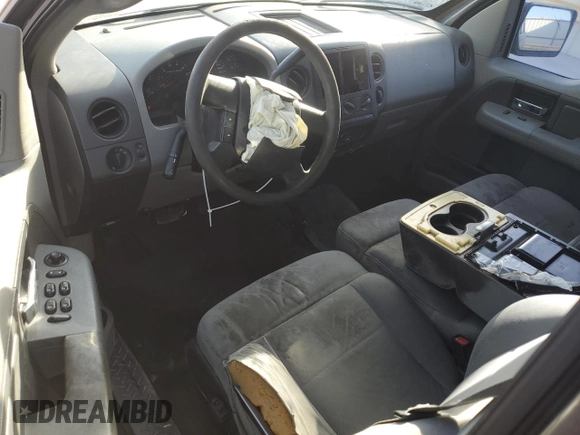 2007 Ford F-150 STX with VIN 1FTRX12W97KD12990, listed as a Copart auction lot 46939335 with 216,759 mi miles and Salvage Title. Bid and sale history available at DreamBid. Image 8.