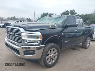 2020 Ram 2500 Laramie z VIN 3C6UR5FL6LG284652, wystawiony jako IAAI lot #41536970 z przebiegiem 92 566 mil mil oraz . Historia ofert i sprzedaży dostępna na DreamBid. Obrazek 2.
