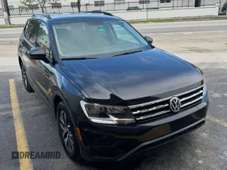2021 Volkswagen Tiguan S z VIN 3VV1B7AX9MM105997, wystawiony jako Copart lot #60985105 z przebiegiem 146 399 mil mil oraz Czysty tytuł • Clean title. Historia ofert i sprzedaży dostępna na DreamBid. Obrazek 1.