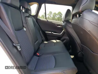 2023 Toyota RAV4 Hybrid XSE with VIN 2T3E6RFV5PW043640, listed as a Copart auction lot 64097125 with 13,686 mi miles and Salvage title. Bid and sale history available at DreamBid. Image 11.