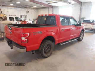 2018 Ford F-150 XL with VIN 1FTEW1E55JFA81946, listed as a IAAI auction lot 42128253 with 129,975 mi miles. Bid and sale history available at carsss.com. Image 4.