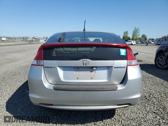 2010 Honda Insight EX z VIN JHMZE2H74AS034758, wystawiony jako Copart lot #52905445 z przebiegiem 154 148 mil mil oraz Szkoda całkowita • Salvage title. Historia ofert i sprzedaży dostępna na DreamBid. Obrazek 6.