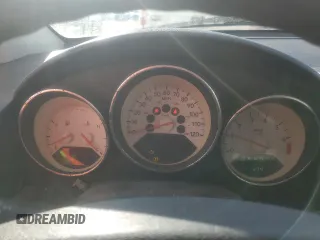 2009 Dodge Caliber SXT z VIN 1B3HB48A59D104136, wystawiony jako Copart lot #45971285 z przebiegiem 291 374 mil mil oraz Szkody całkowita. Historia ofert i sprzedaży dostępna na DreamBid. Obrazek 9.