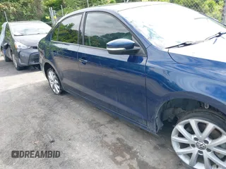 2012 Volkswagen Jetta SE with VIN 3VWDX7AJ1CM389470, listed as a IAAI auction lot 41011343 with 133,295 mi miles and . Bid and sale history available at DreamBid. Image 6.