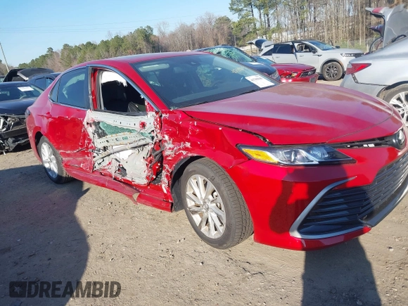 2024 Toyota Camry LE z VIN 4T1R11AK3RU254717, wystawiony jako IAAI lot #41709040 z przebiegiem 11 338 mil mil oraz . Historia ofert i sprzedaży dostępna na DreamBid. Obrazek 1.