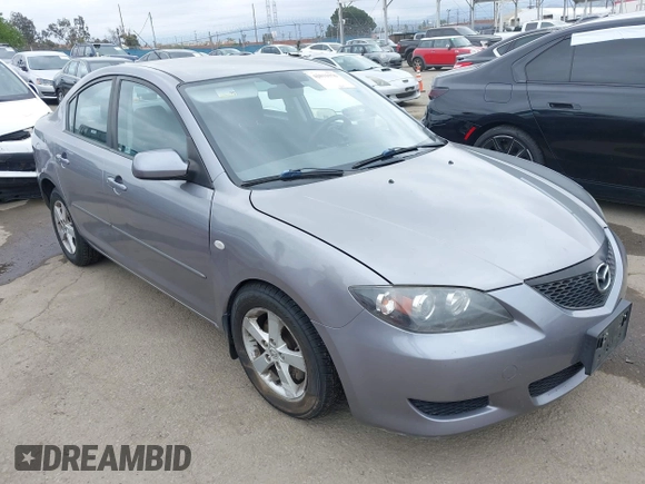 2006 Mazda 3 i with VIN JM1BK12F261420775, listed as a IAAI auction lot 42031576 with 145,530 mi miles. Bid and sale history available at carsss.com. Image 1.