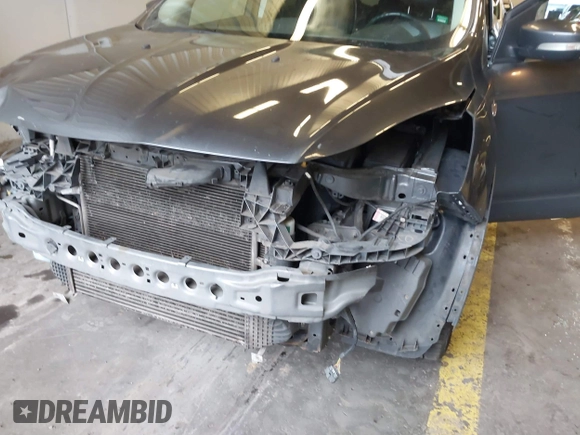 2016 Ford Escape Titanium with VIN 1FMCU9J92GUB63525, listed as a IAAI auction lot 41469824 with 156,773 mi miles. Bid and sale history available at carsss.com. Image 17.