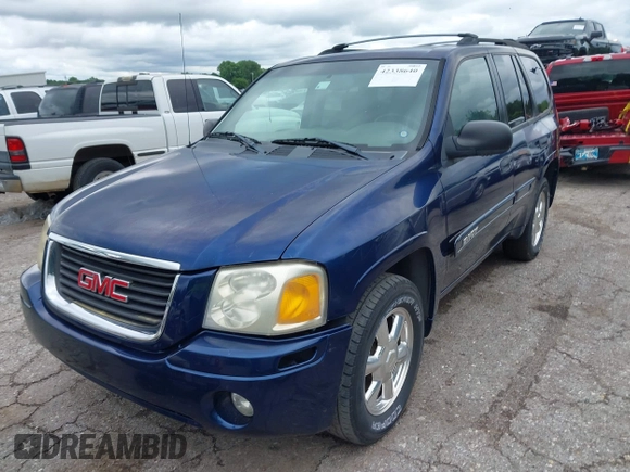 2003 GMC Envoy SLE z VIN 1GKDS13S432414698, wystawiony jako IAAI lot #42338640 z przebiegiem 210 988 mil mil oraz . Historia ofert i sprzedaży dostępna na DreamBid. Obrazek 2.