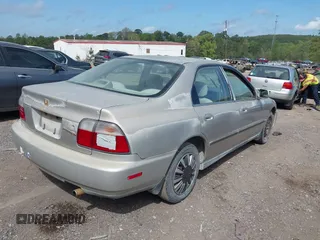 1996 Honda Accord LX with VIN 1HGCD5635TA258353, listed as a IAAI auction lot 41963481 with 215,926 mi miles and . Bid and sale history available at carsss.com. Image 4.