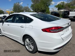 2018 Ford Fusion Hybrid SE with VIN 3FA6P0LU5JR173833, listed as a Copart auction lot 55092565 with 83,242 mi miles and Clean Title. Bid and sale history available at carsss.com. Image 3.