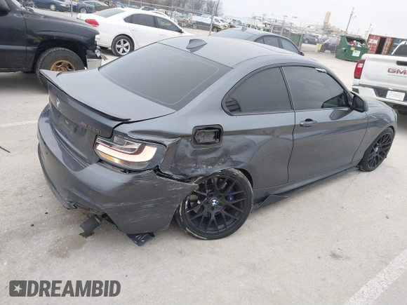 2014 BMW 2 Series M235i with VIN WBA1J7C57EVW84554, listed as a IAAI auction lot 41564175 with 121,632 mi miles and . Bid and sale history available at carsss.com. Image 4.