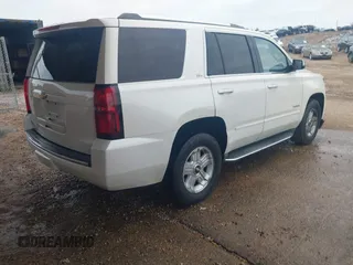 2015 Chevrolet Tahoe LTZ with VIN 1GNSCCKC1FR265370, listed as a IAAI auction lot 42131294 with 217,064 mi miles and . Bid and sale history available at DreamBid. Image 4.