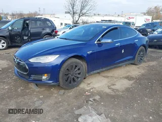 2016 Tesla Model S 90D with VIN 5YJSA1E21GF128362, listed as a IAAI auction lot 40891999 with 179,155 mi miles and . Bid and sale history available at DreamBid. Image 2.