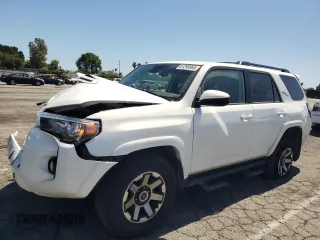 2020 Toyota 4Runner SR5 with VIN JTEBU5JR4L5738300, listed as a Copart auction lot 61290065 with 94,883 mi miles and Salvage title. Bid and sale history available at DreamBid. Image 1.